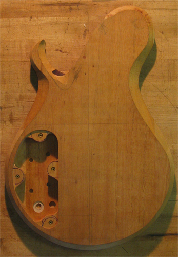 Back of a Xylem custom guitar after carving with mahogany core