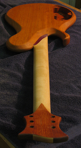 Mahogany body, maple neck and headstock of a Xylem guitar