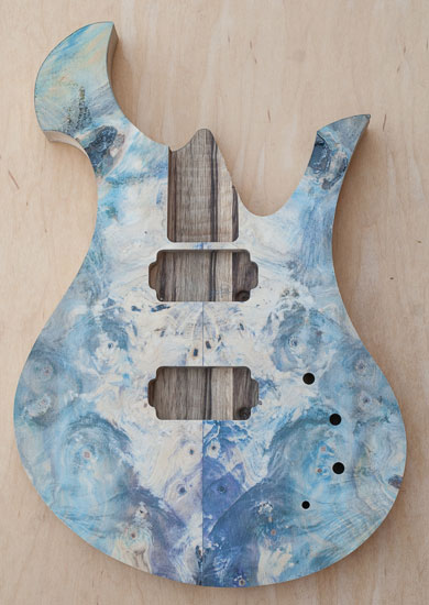 Exotic guitar body with green and yellow buckeye burl top