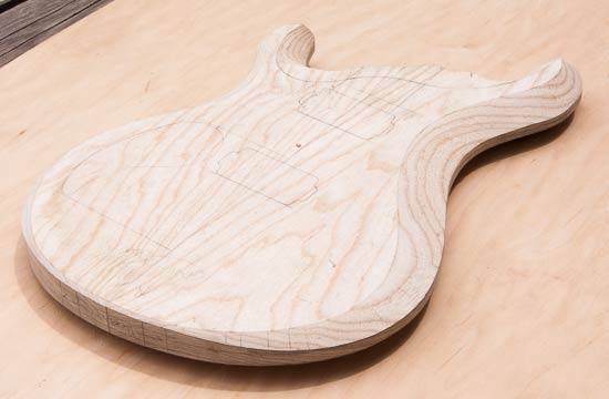 Contoured body bevel on a custom guitar body