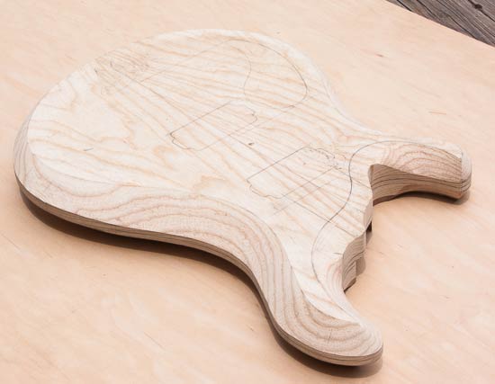 Carved horn of a swamp ash custom guitar