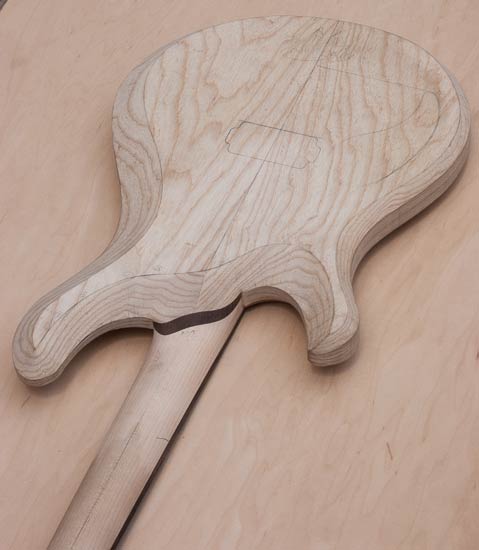 Swamp ash guitar body with wenge neck shim