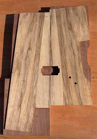 Custom guitar body blank with black limba top