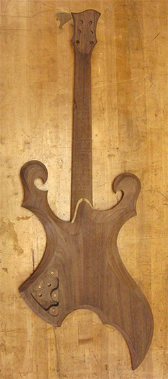 Black walnut body and neck of a custom guitar
